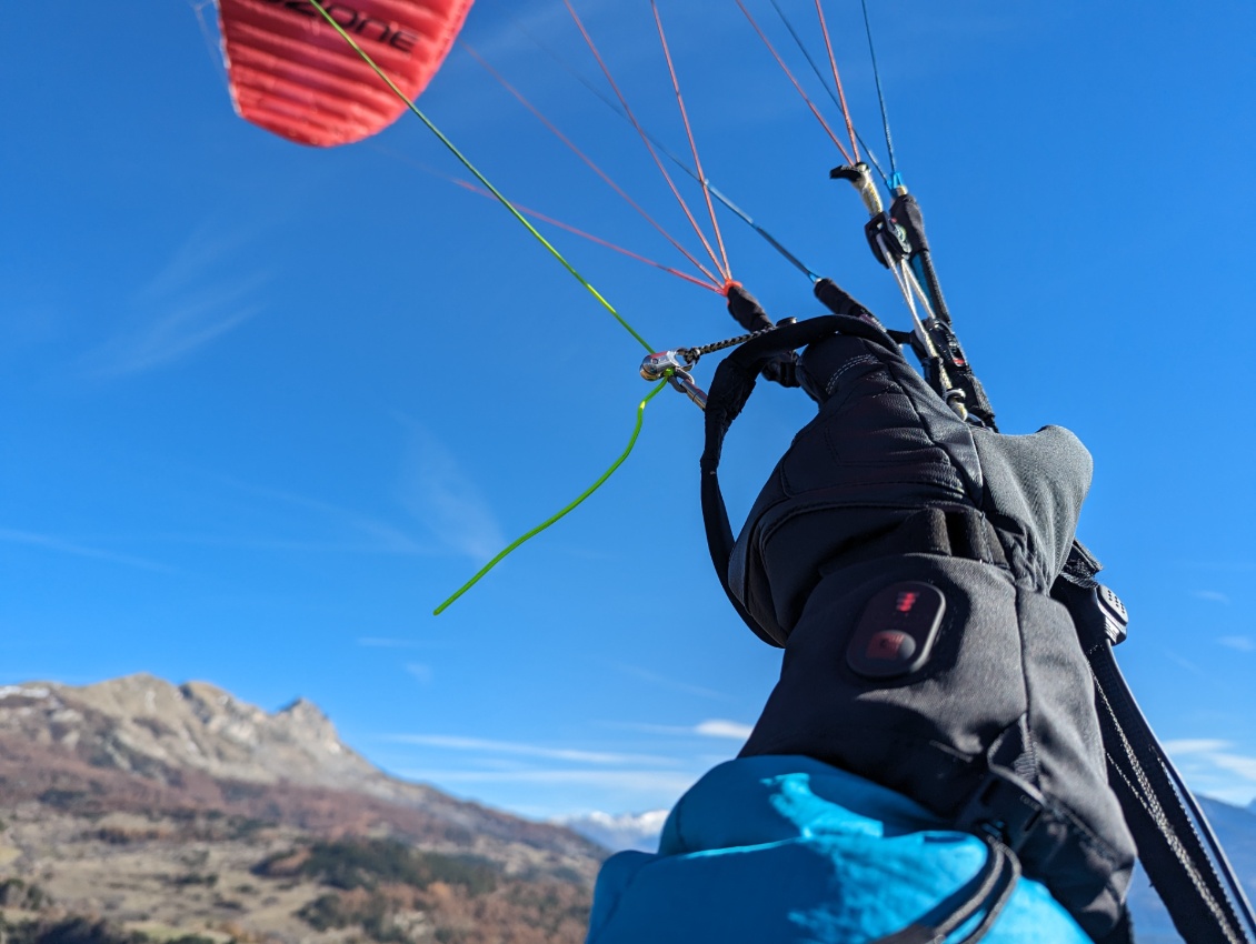 Chauffage à puissance max pour avoir les mains bien au chaud en parapente